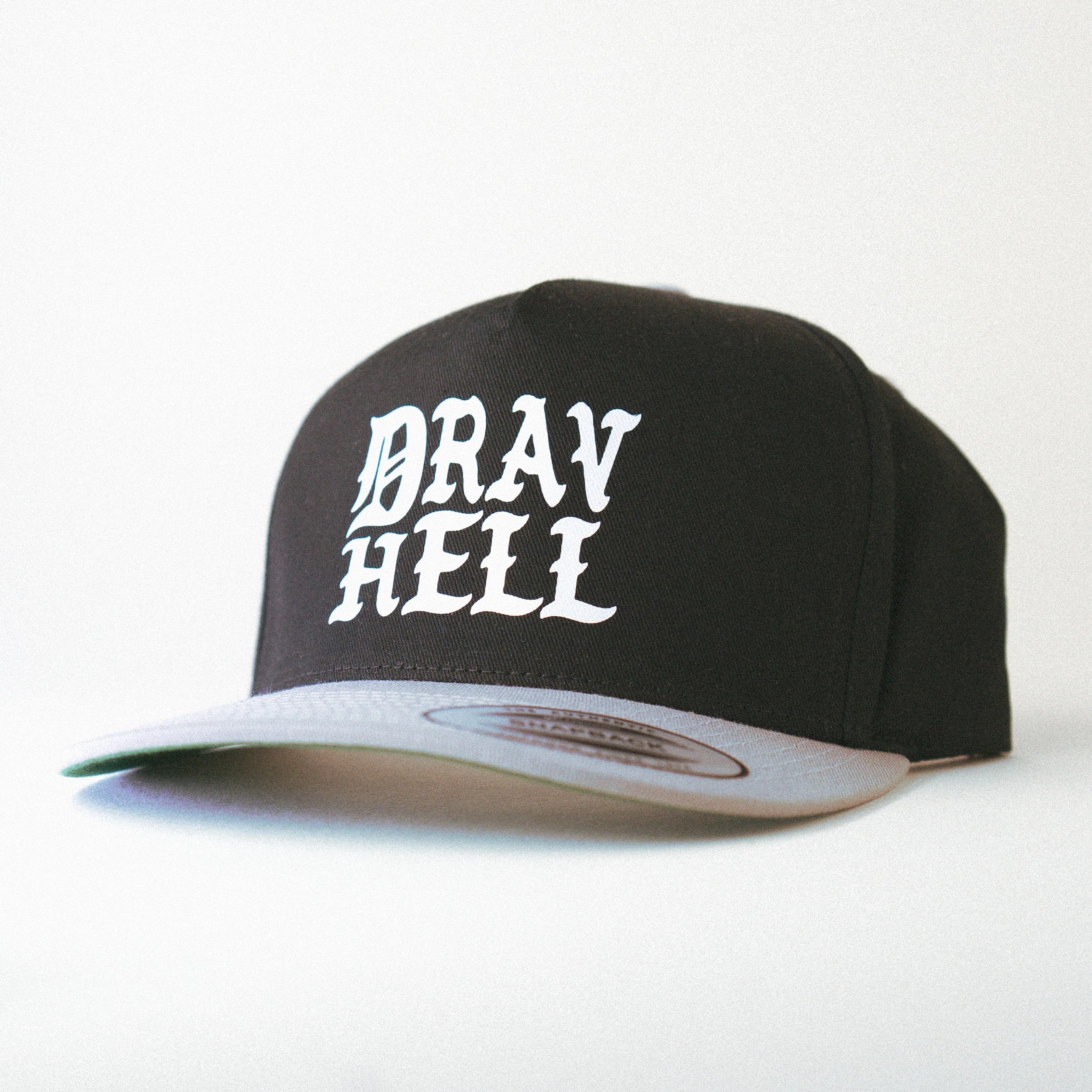 DRAVHELL Svart/grå snapback